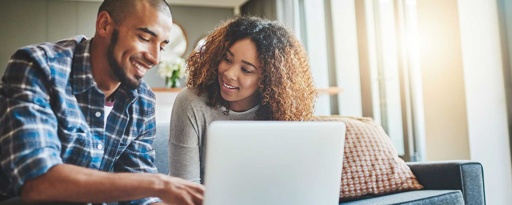 Husband and wife going over monthly budget