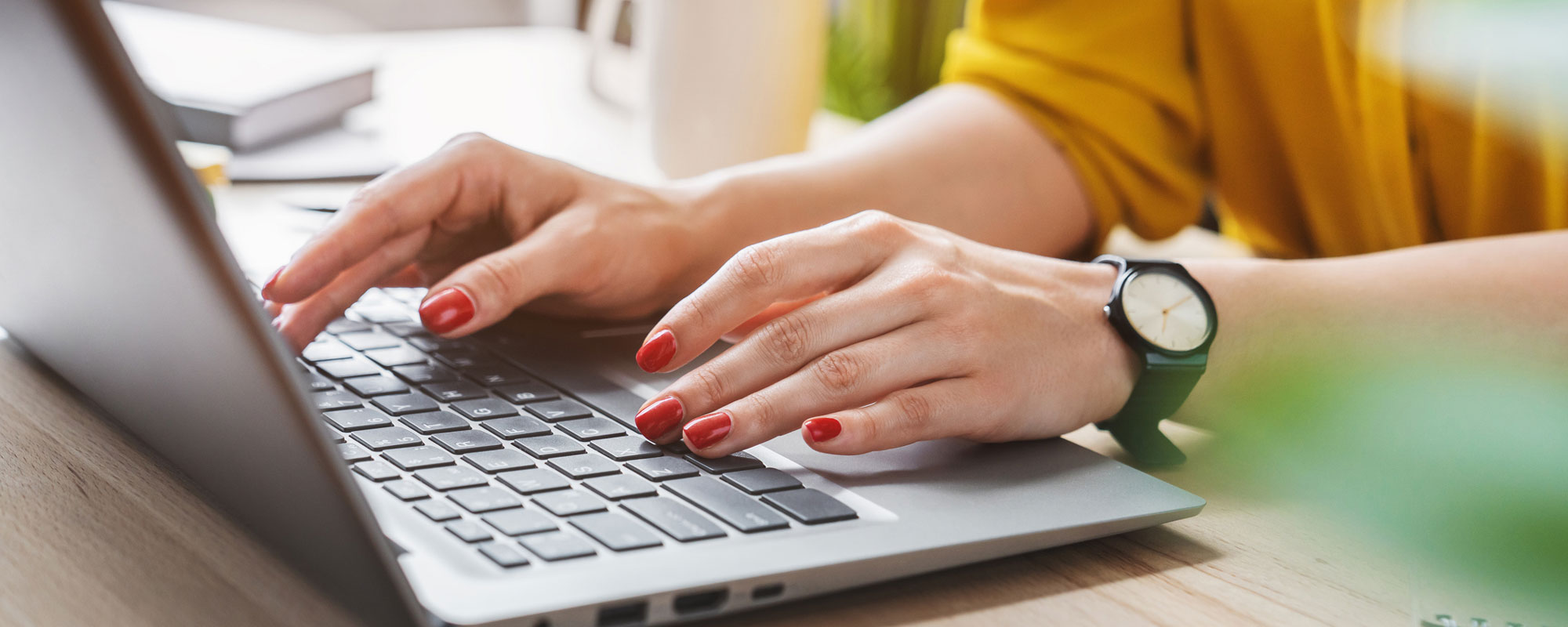 woman typing on keyboard