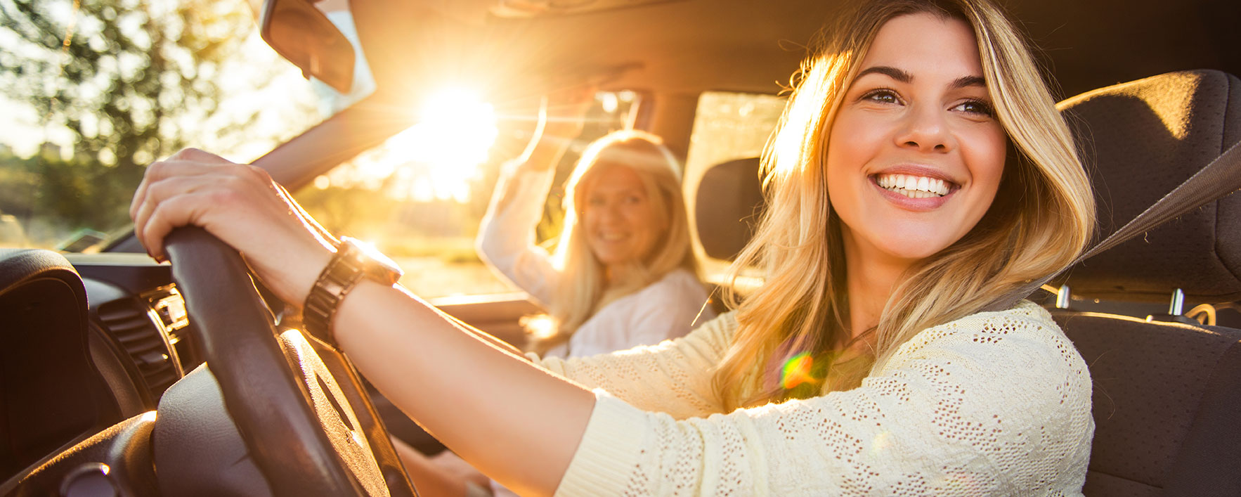 mother and daughter in car