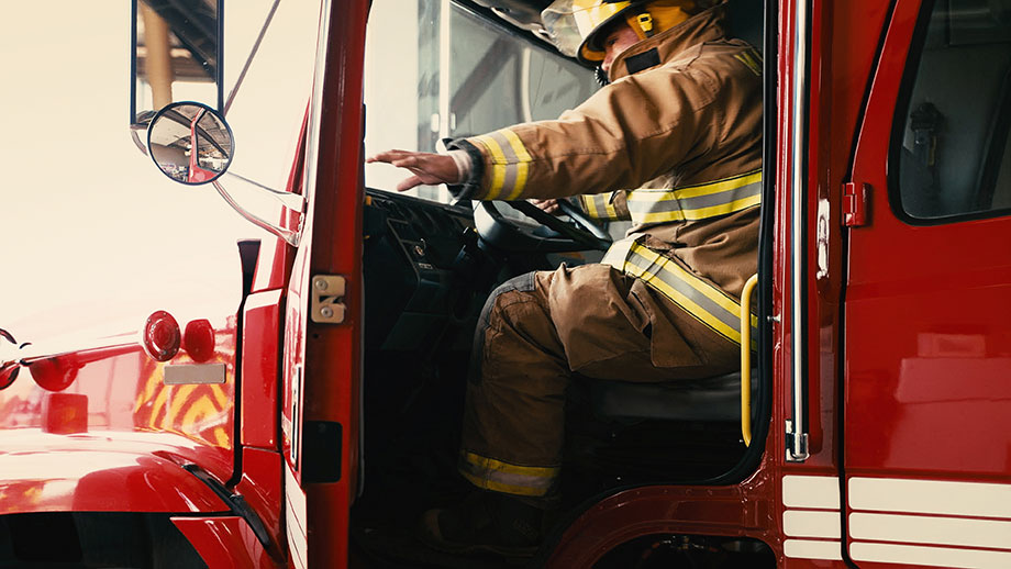 Firefighter in truck