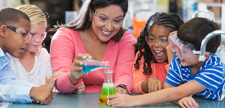 Science teacher with students