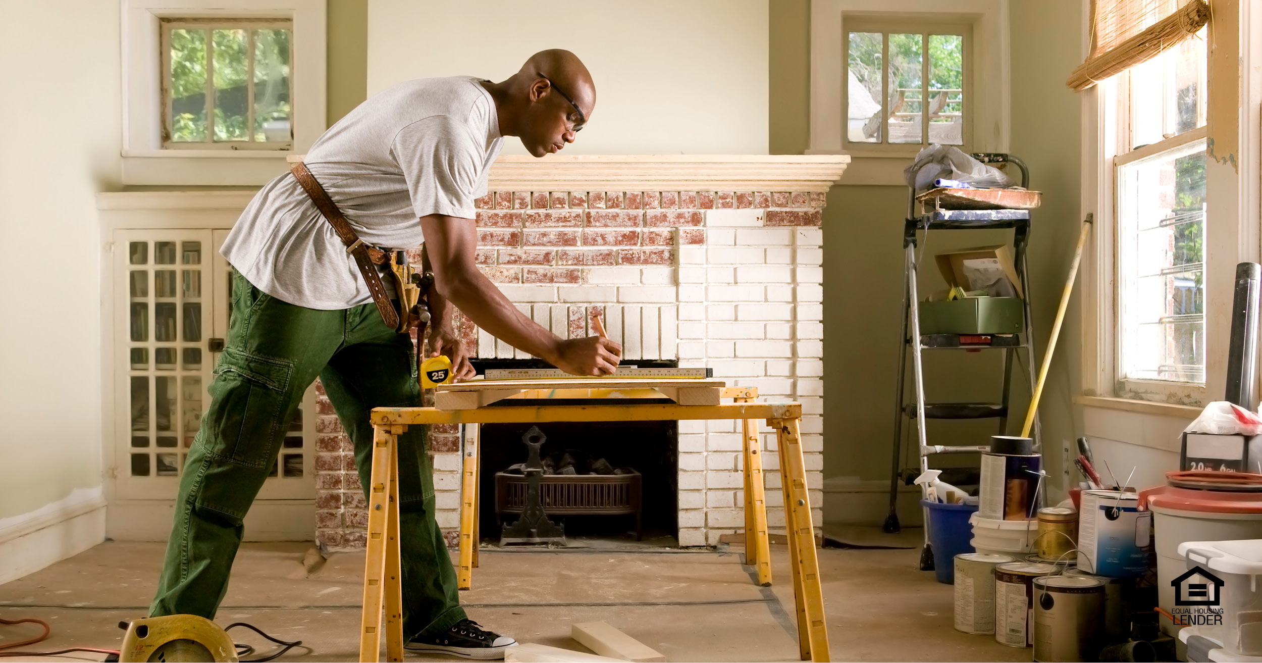 Are a good worker. House Renovation. Мужчина ремонтирует дом. House Remodeling. Home repairing.
