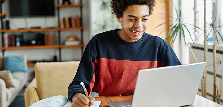 Student studying with laptop